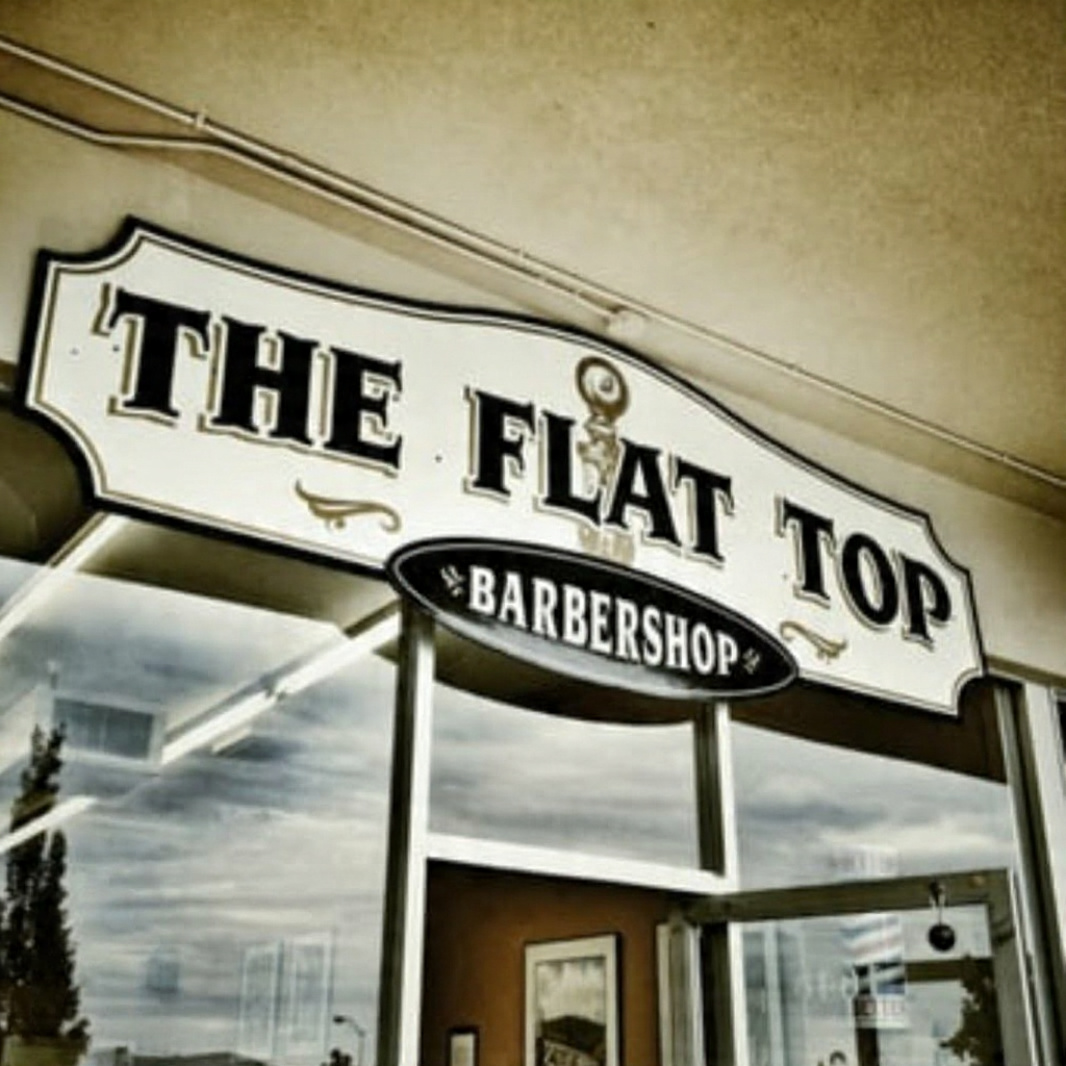 The Flat Top Barbershop sign and exterior
